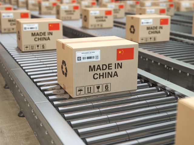Made in China. Cardboard boxes with text made in China and chinese flag on the roller conveyor. 3d illustration